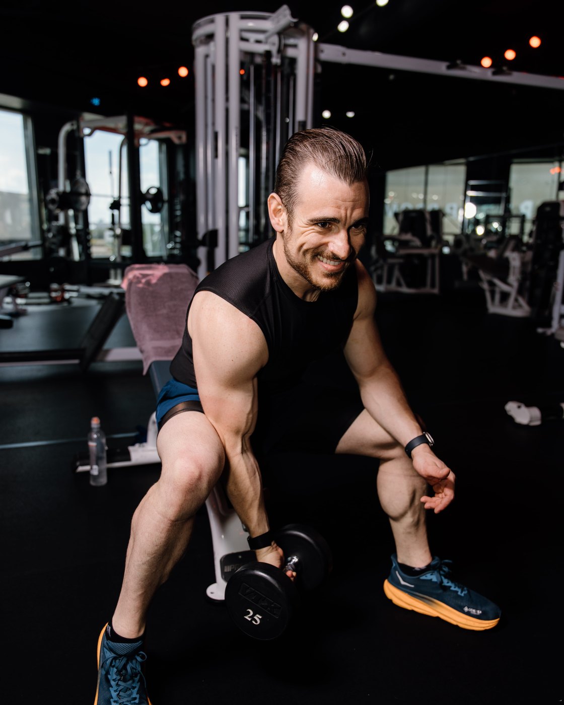 Jonathan Forstall between sets with a dumbbell
