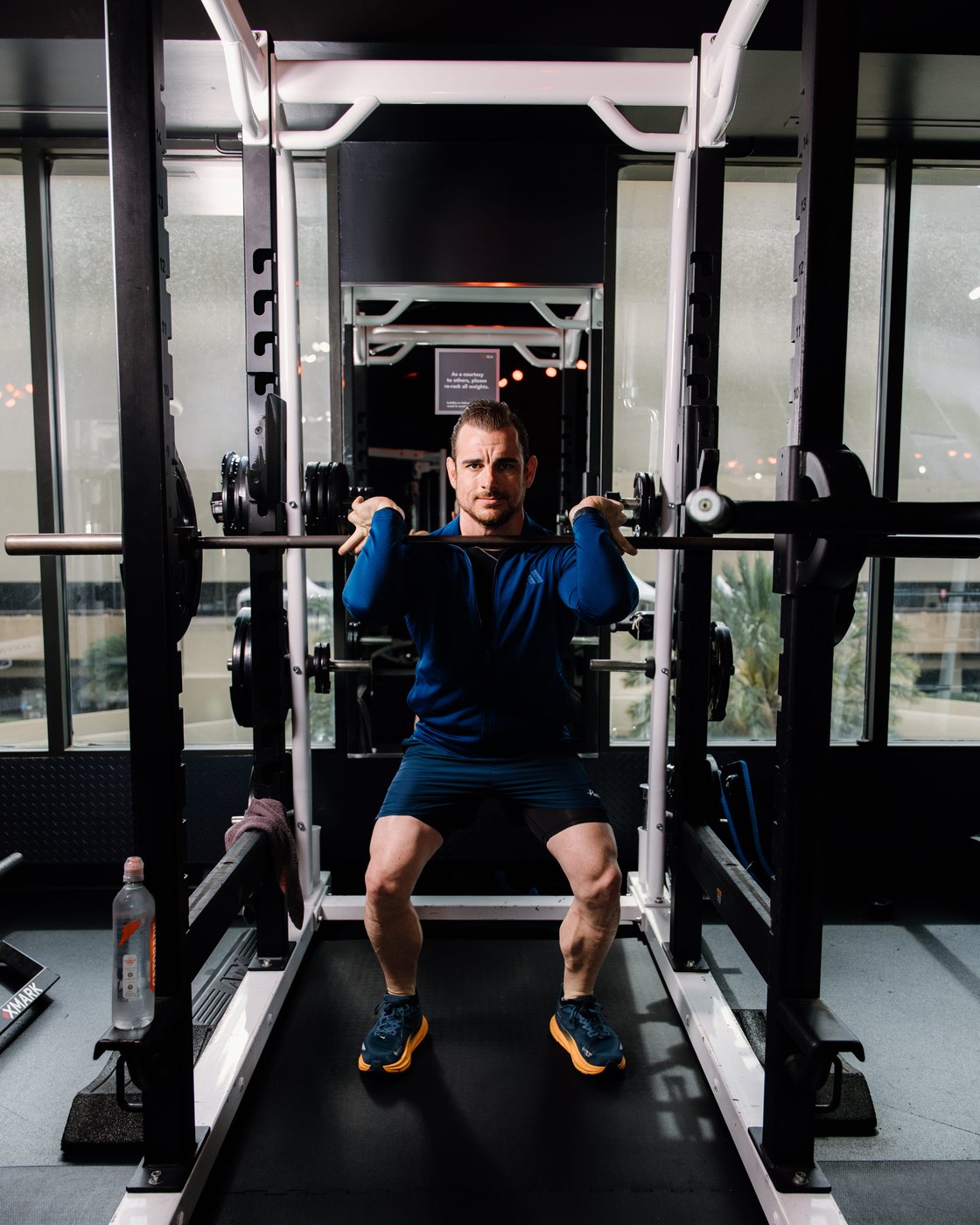 Jonathan Forstall at the bottom of a barbell front squat